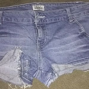 Denim fringed shorts